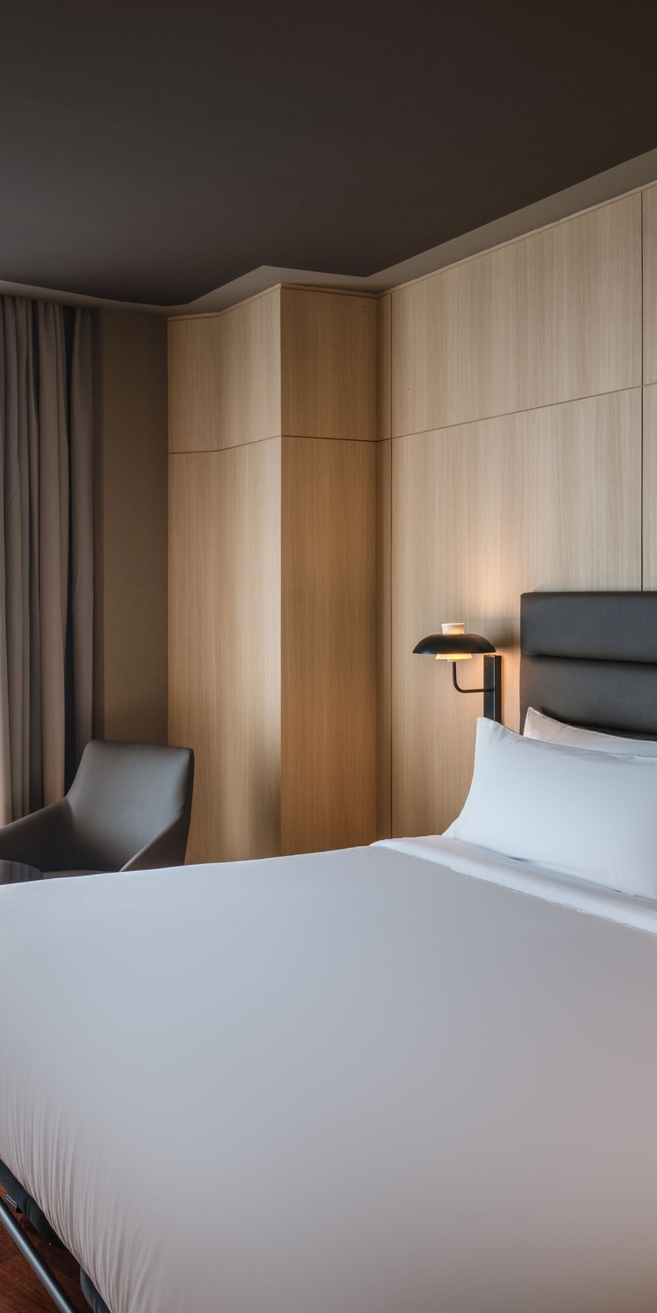 King guest room with balcony and city view