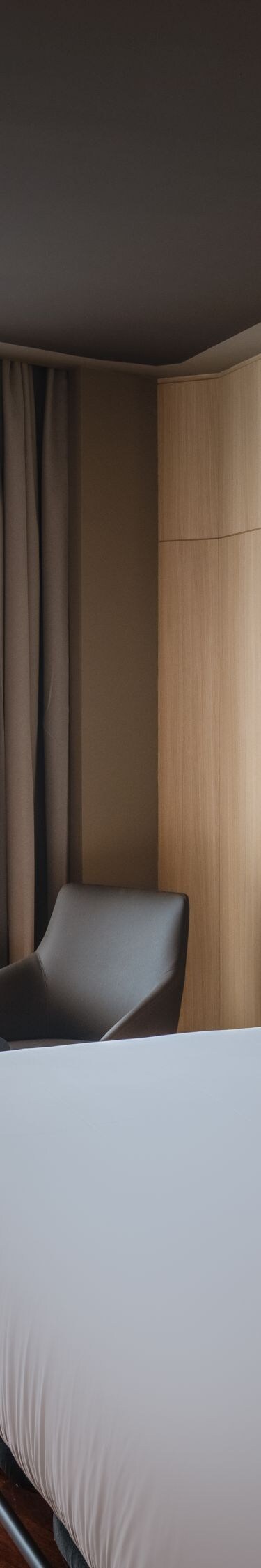 King guest room with balcony and city view