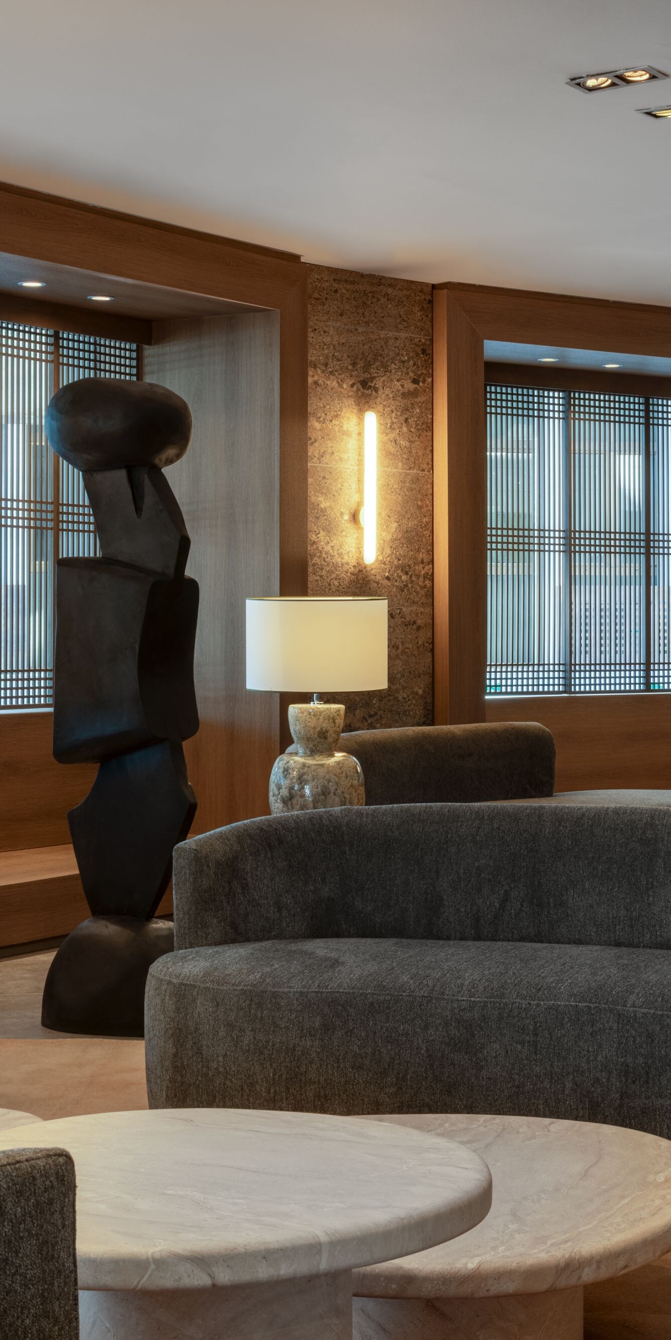 Lobby lounge with sculptural art and seating