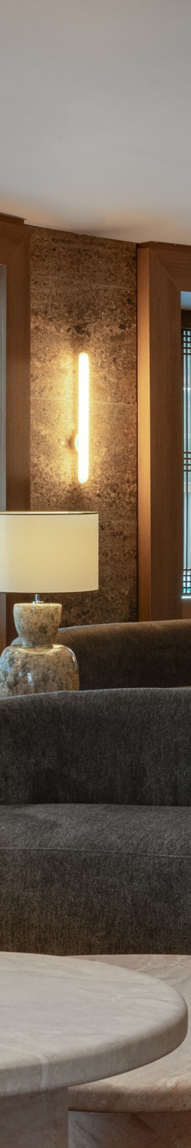 Lobby lounge with sculptural art and seating