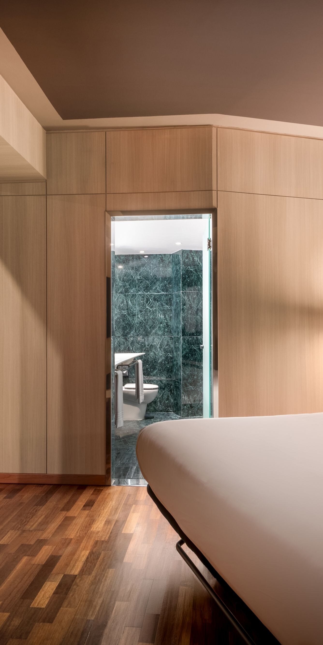 King guest room with marble bathroom