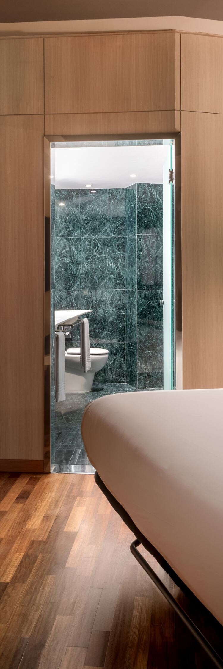 King guest room with marble bathroom