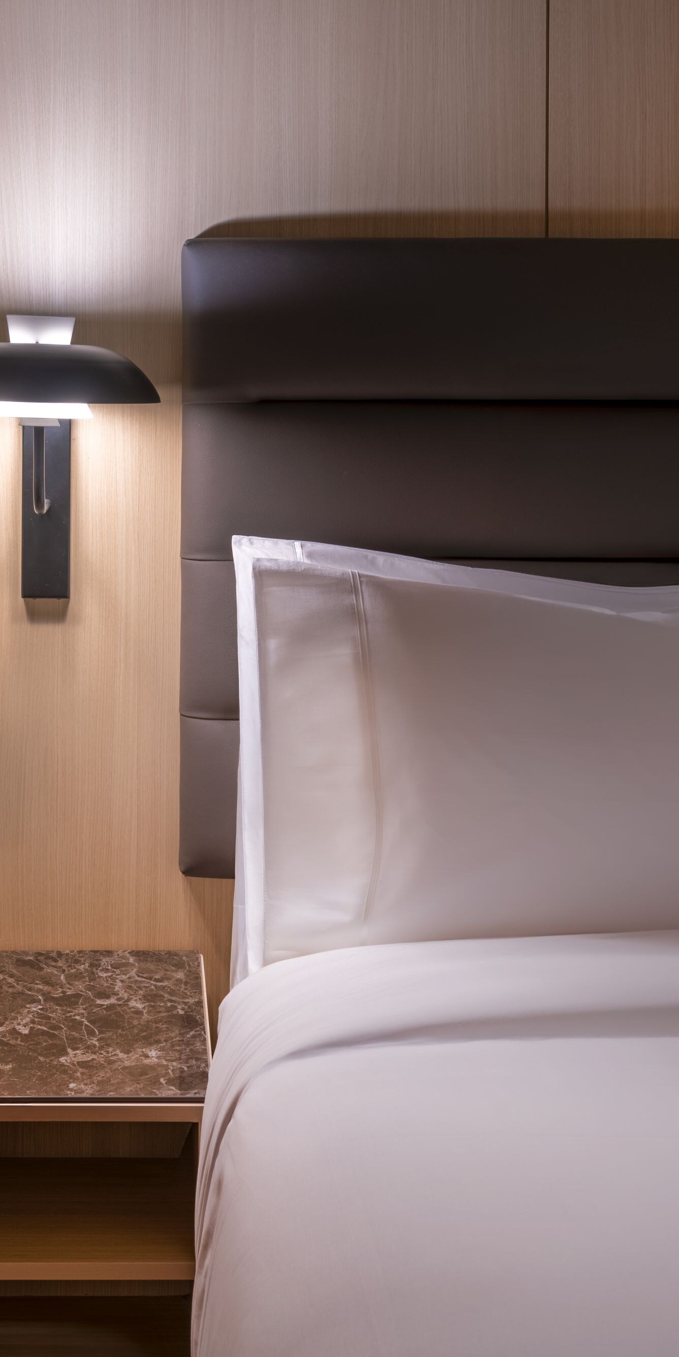 King guest room with marble nightstand