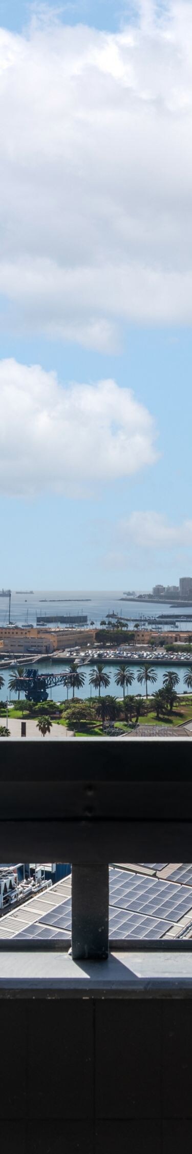 Balcony view overlooking harbor and city