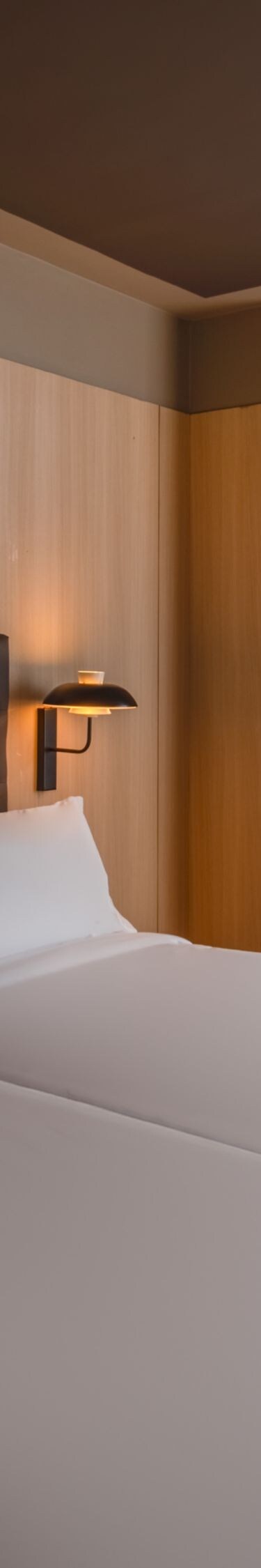 Guest room with two beds and seating area