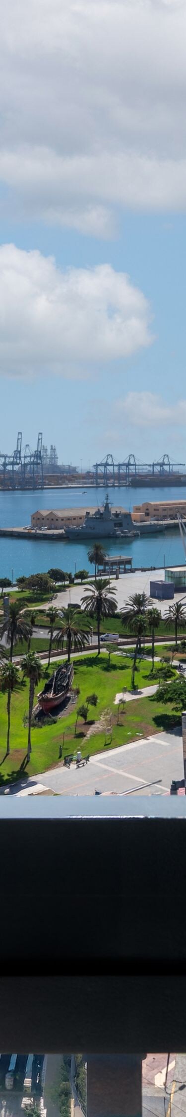 Balcony view of harbor and city skyline