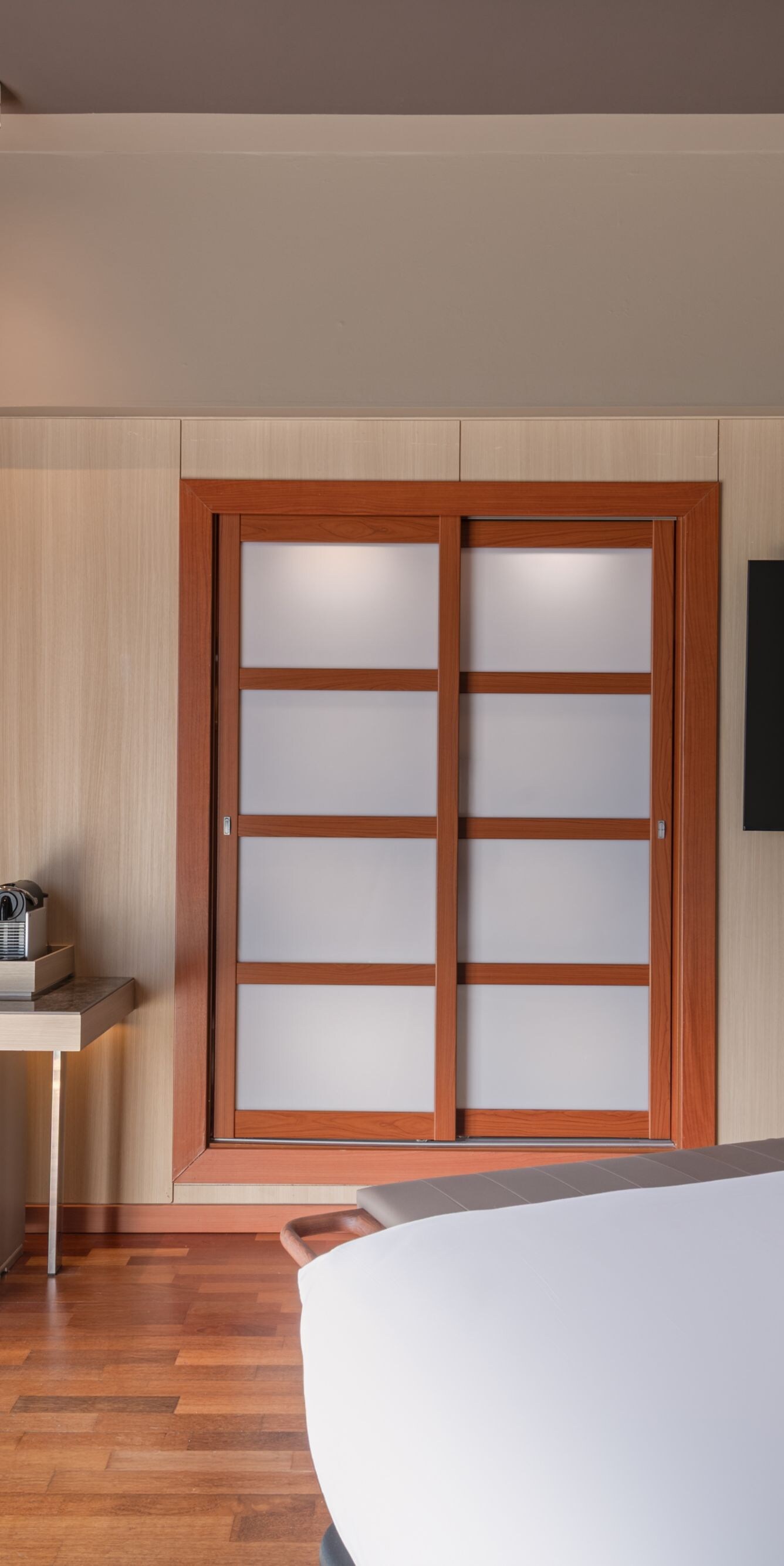 Guest room with king bed and coffee station