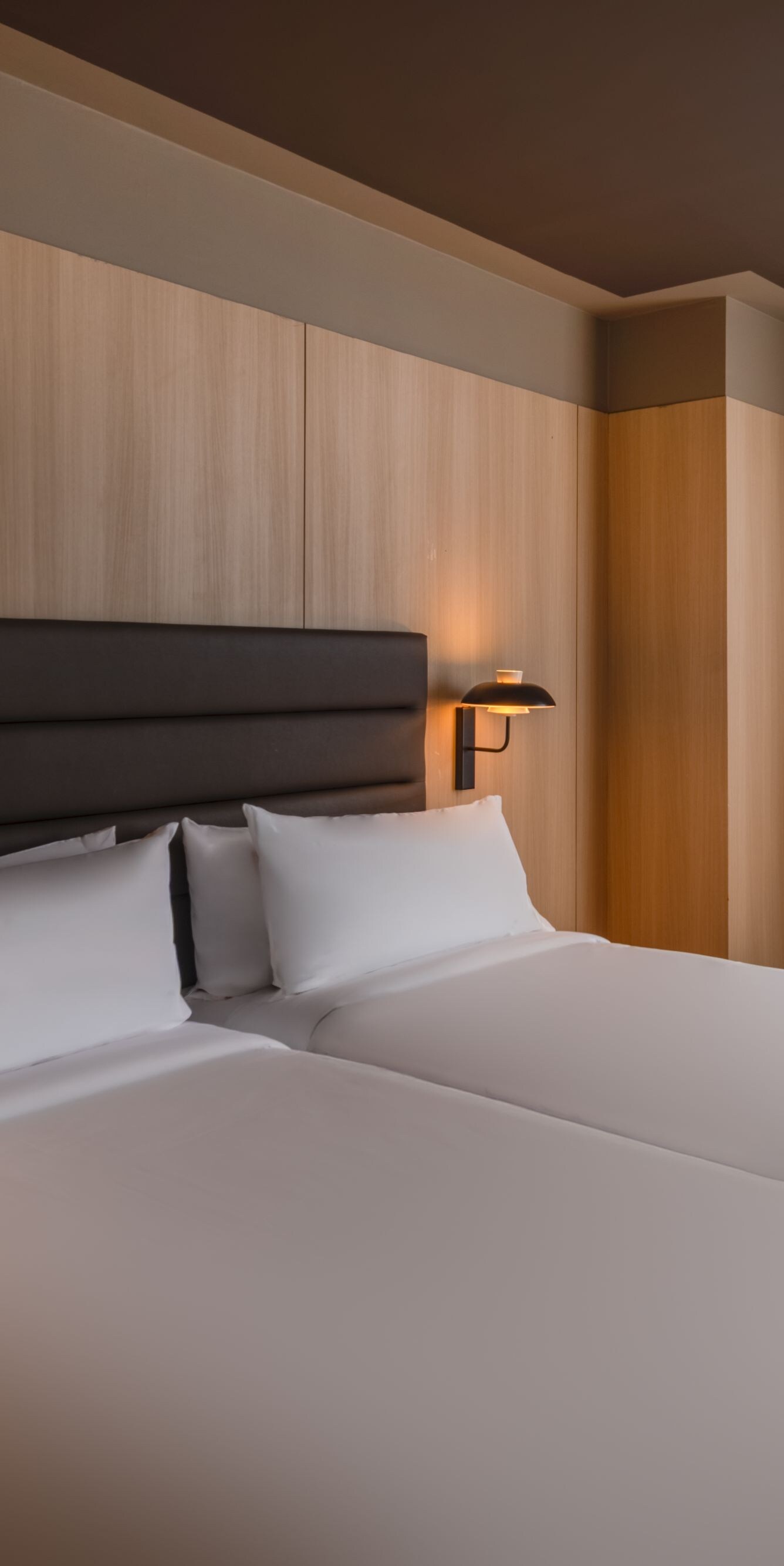 Guest room with two beds and sea view
