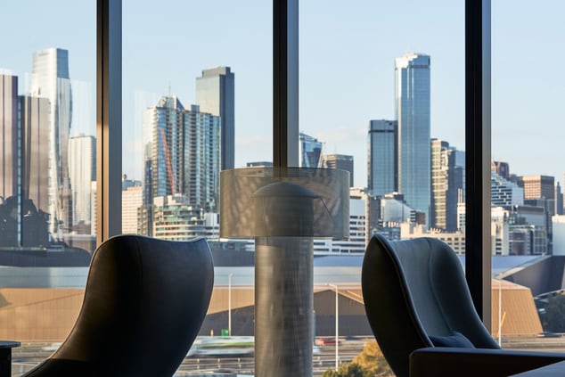 Lobby lounge armchairs with city view
