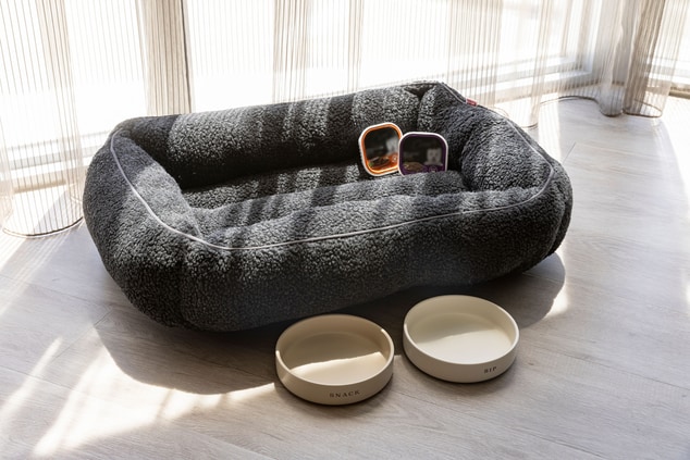 Dog bed with dishes