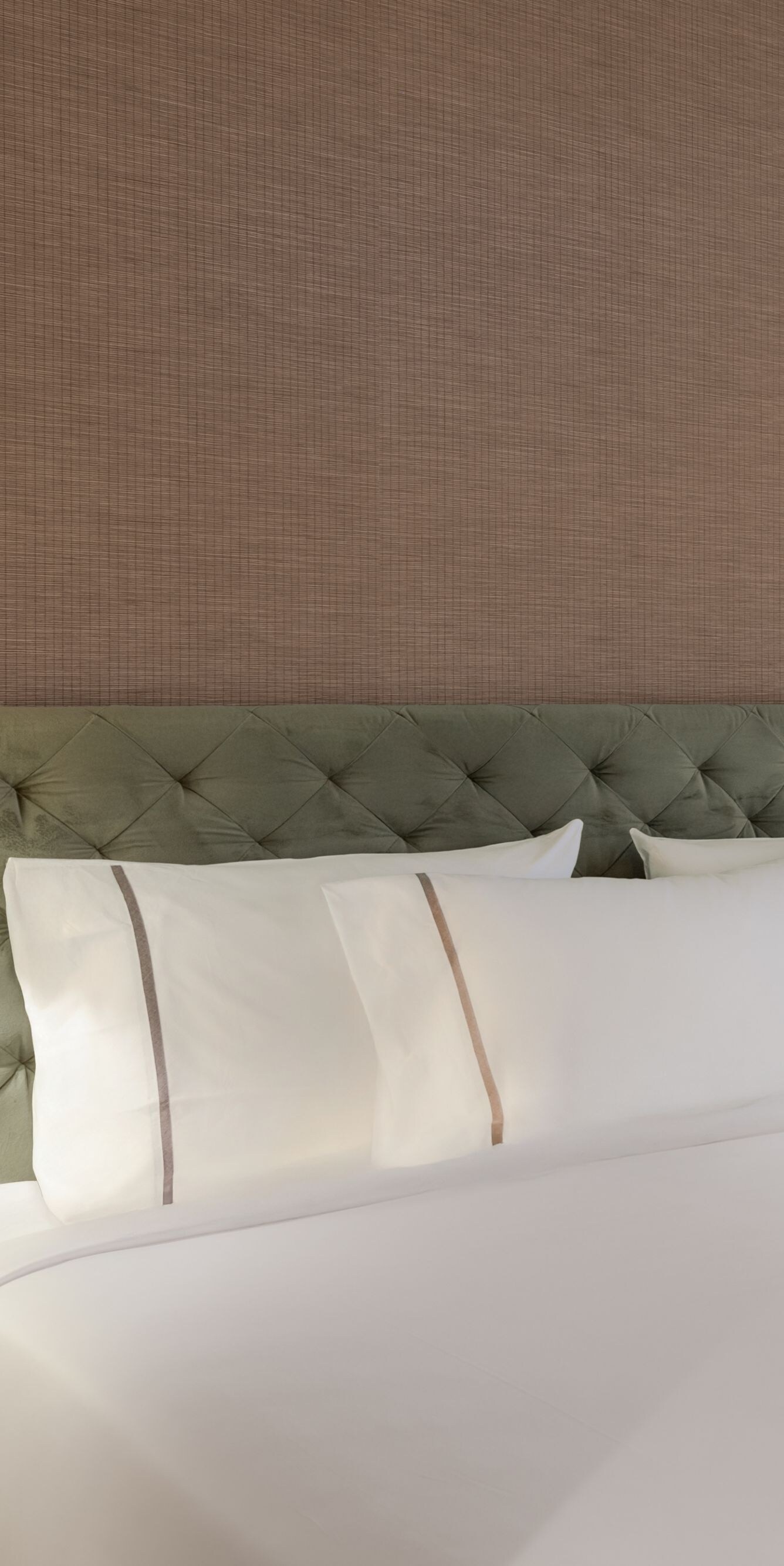 King bed with tufted headboard and lighting