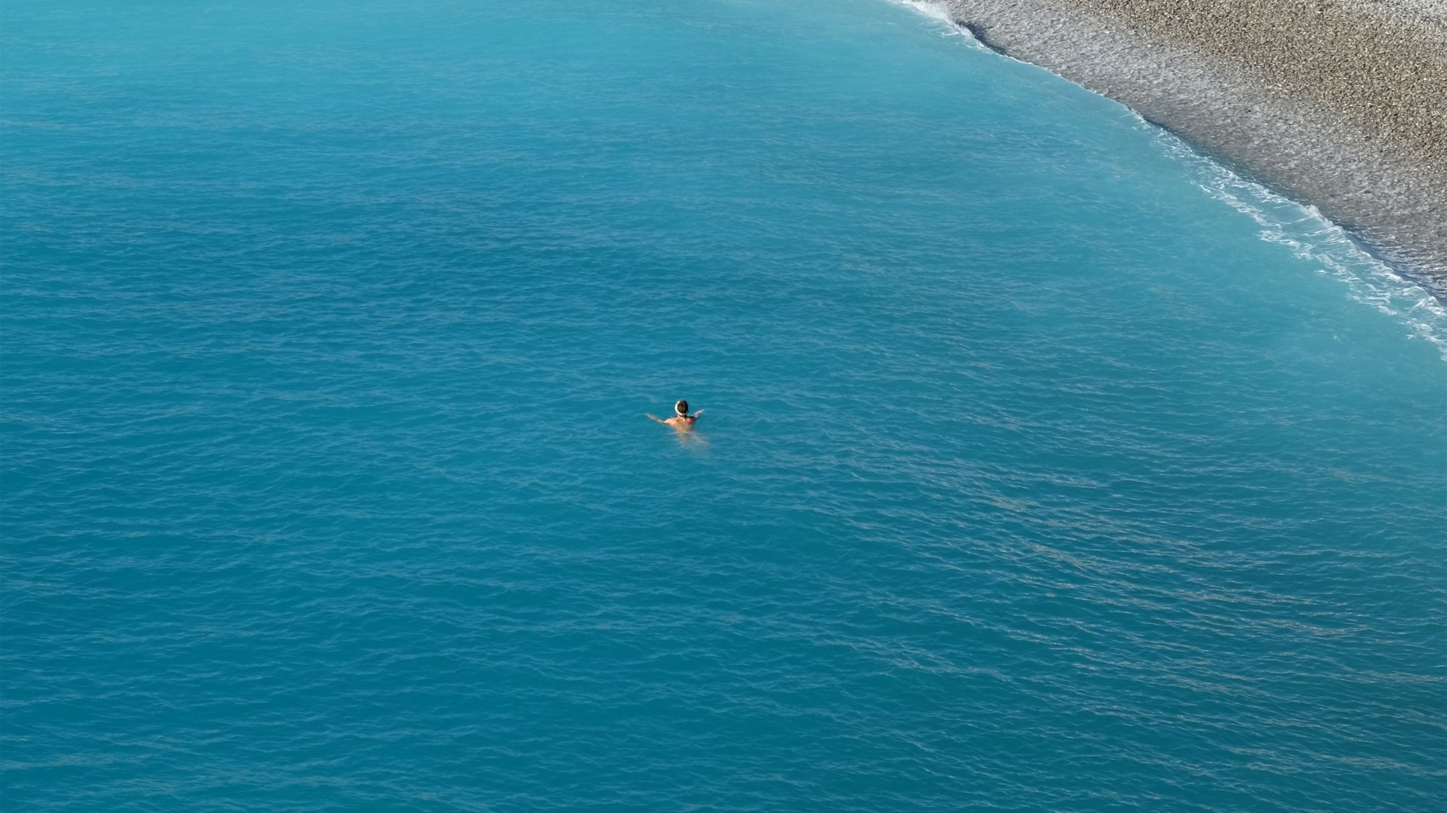 Swim in the azure waters of the Mediterranean Sea.