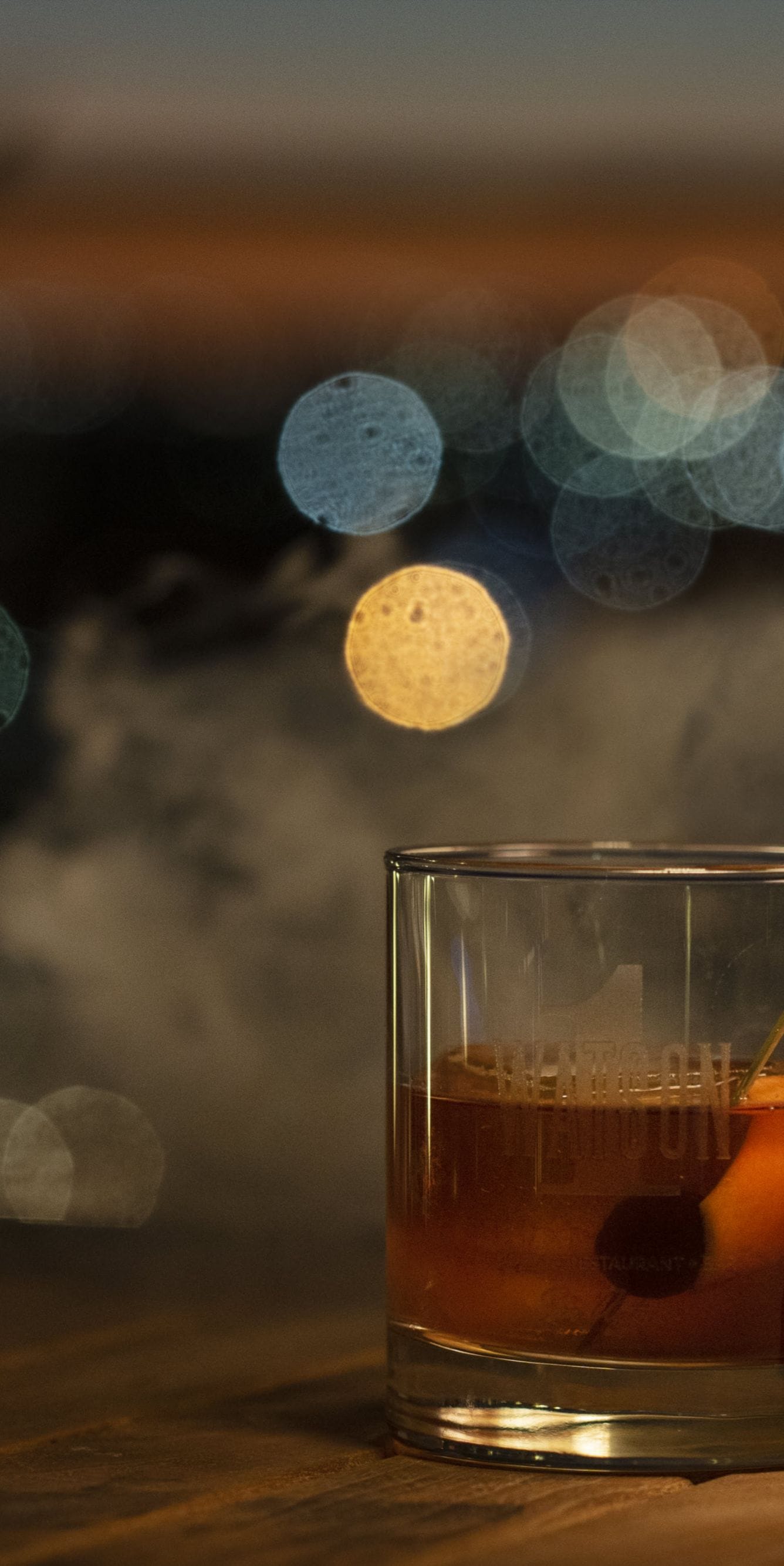 Bartender pouring a whiskey drink