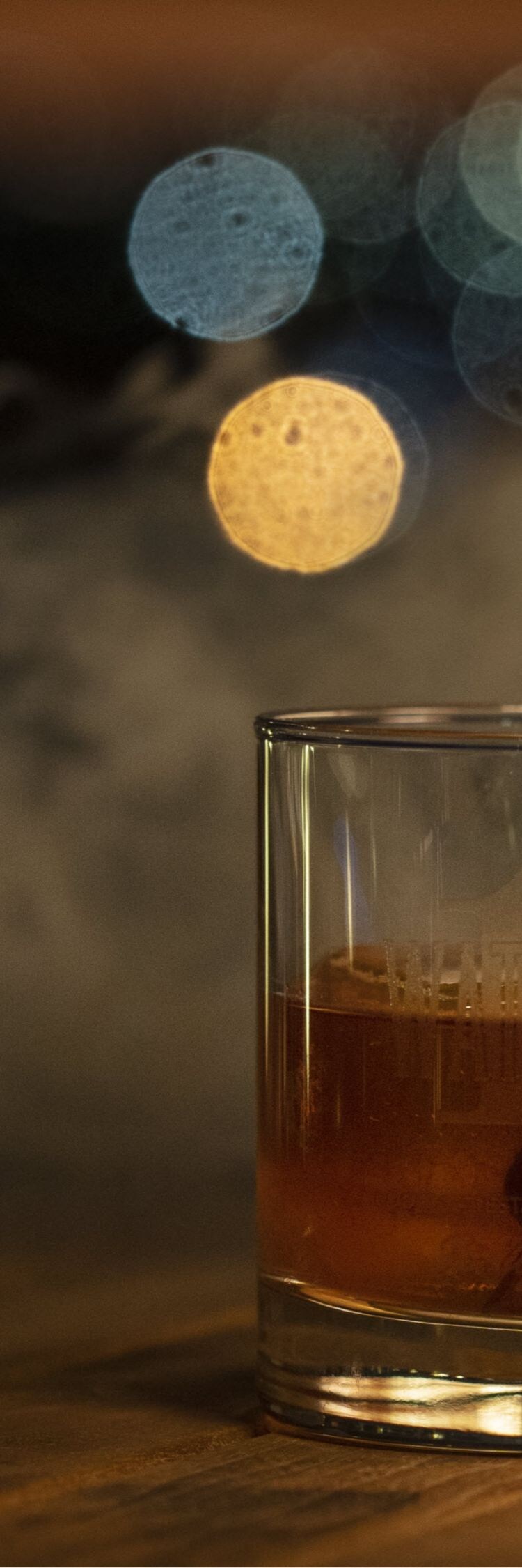 Bartender pouring a whiskey drink