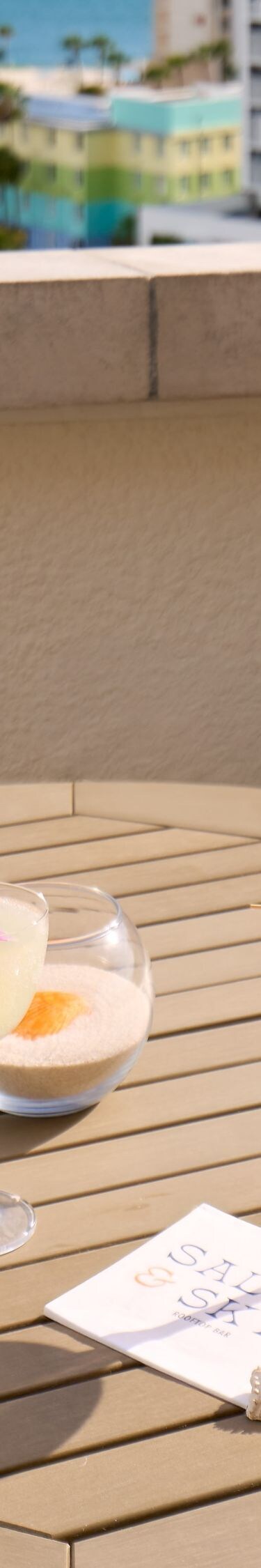 Cocktails on terrace with city skyline view
