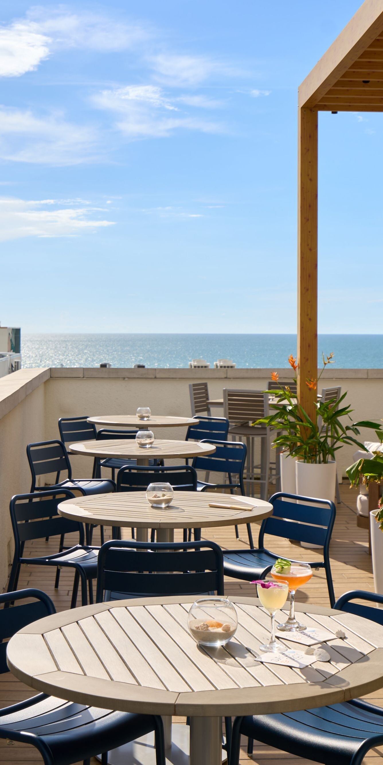 Rooftop terrace with sea views and cocktails