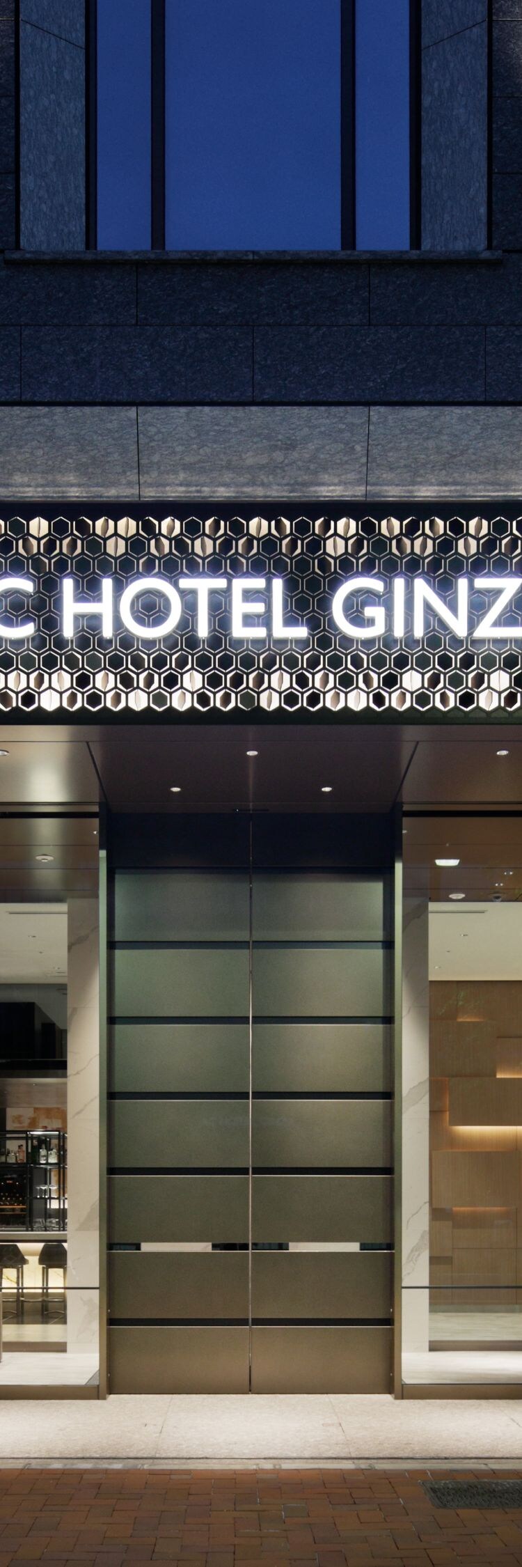 Exterior entrance with illuminated signage