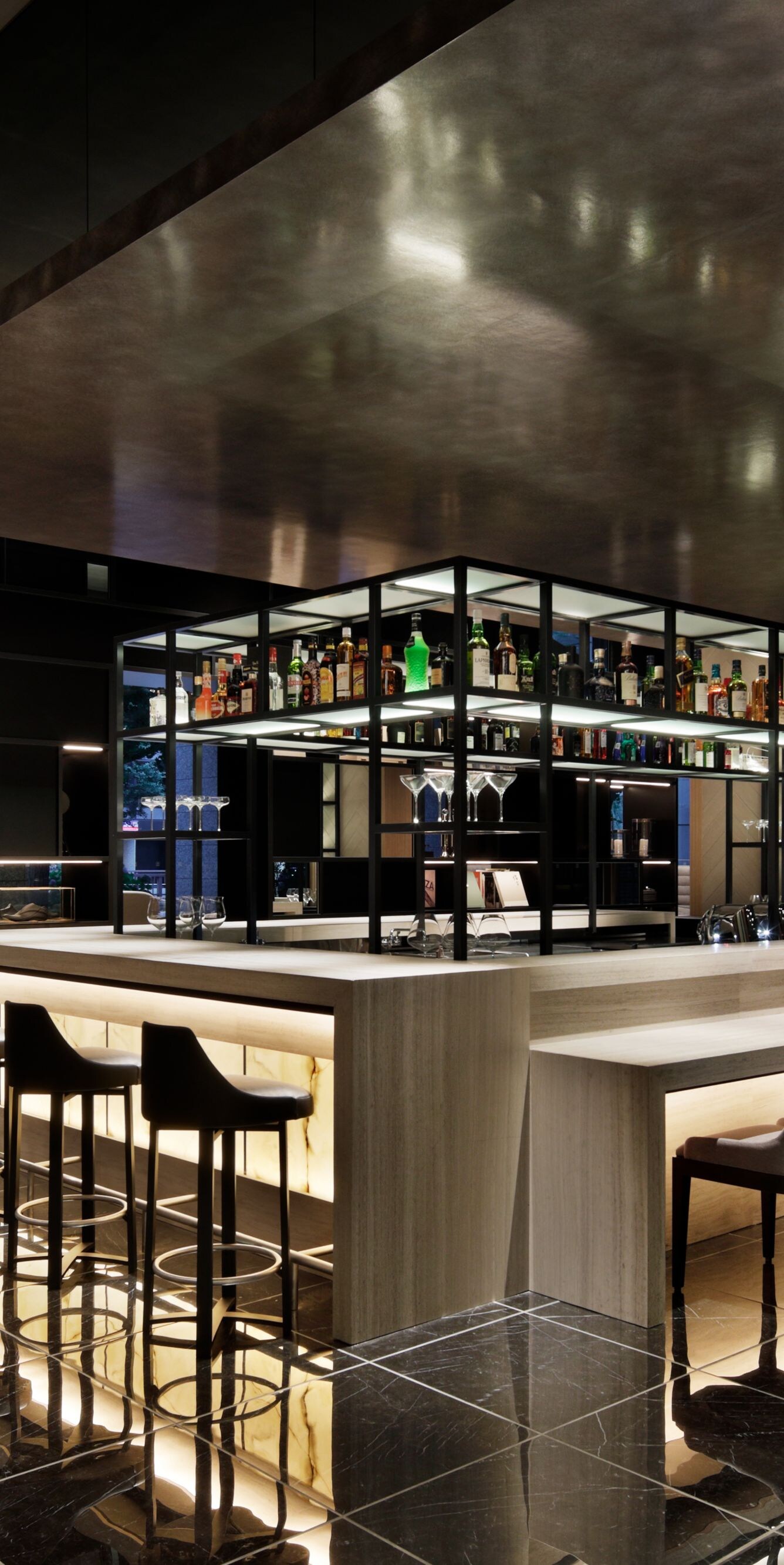 Modern bar with marble floors and lighting