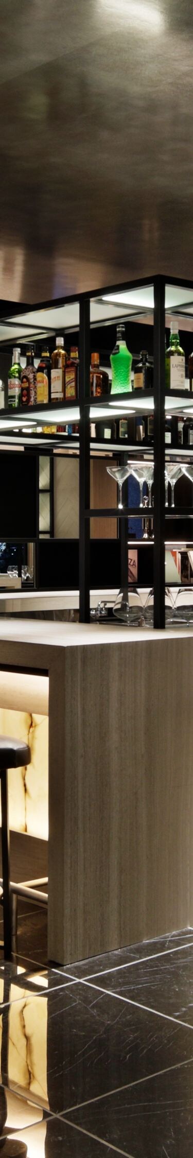 Modern bar with marble floors and lighting