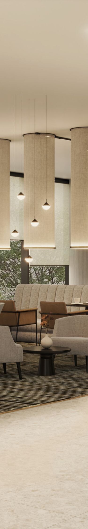 tables, chairs, and pillars in large lobby