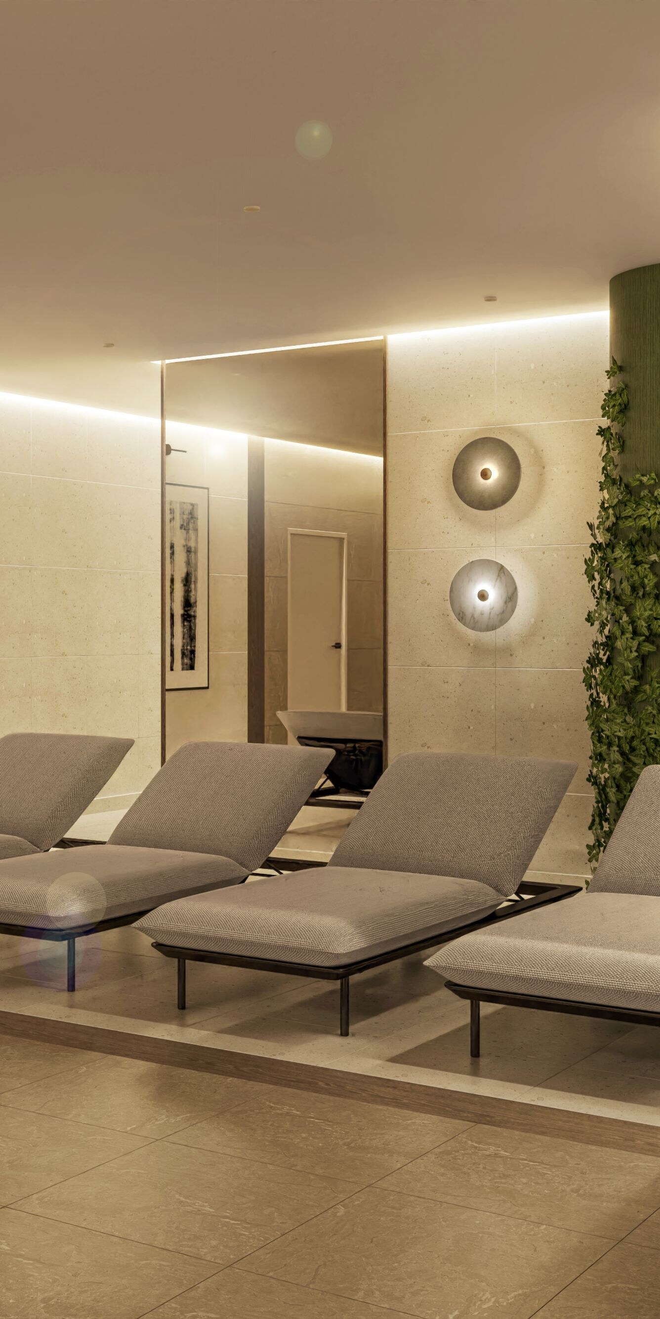 Spa relaxation room with lounge chairs and robes