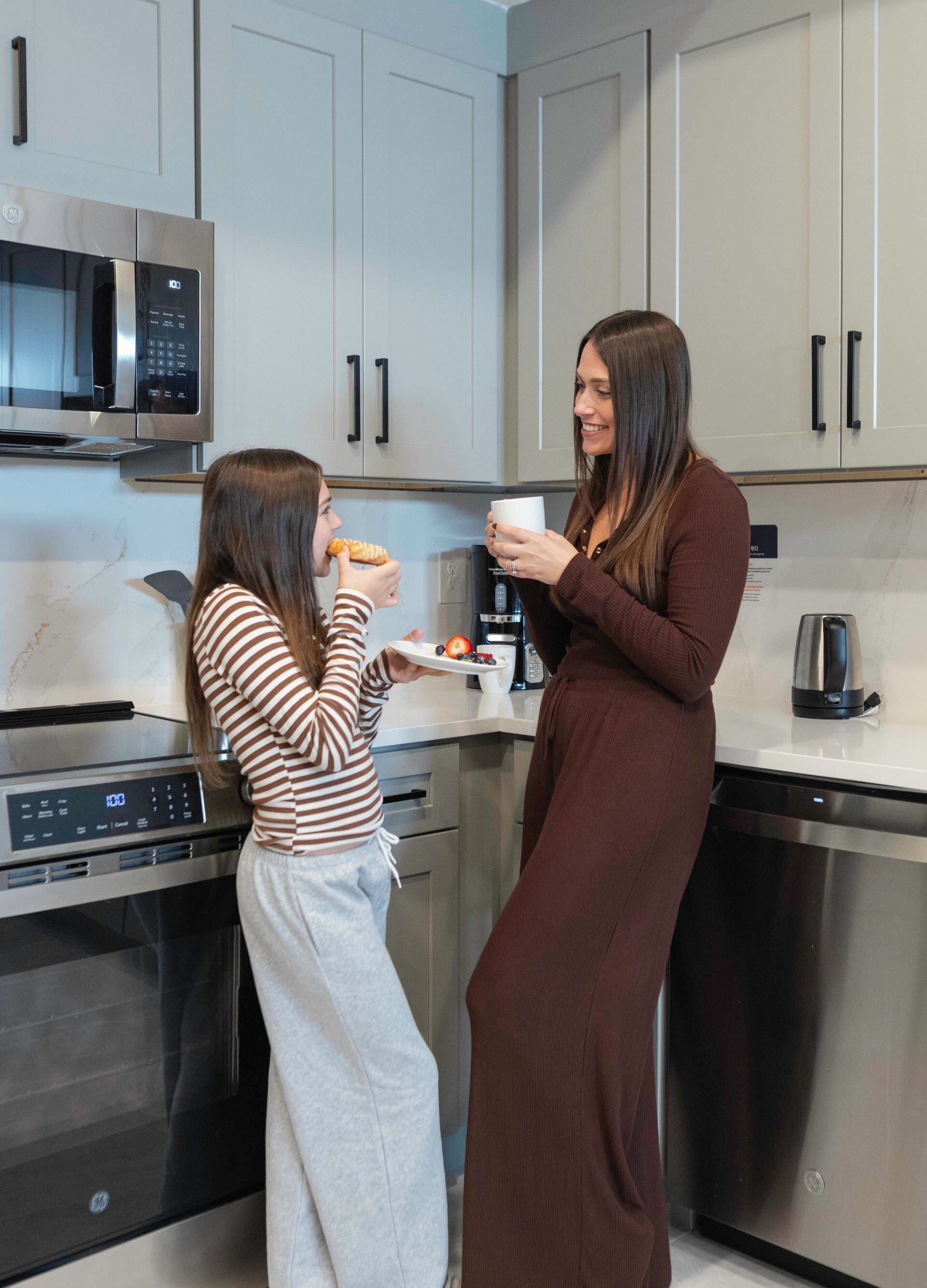 Open kitchen with multiple guests