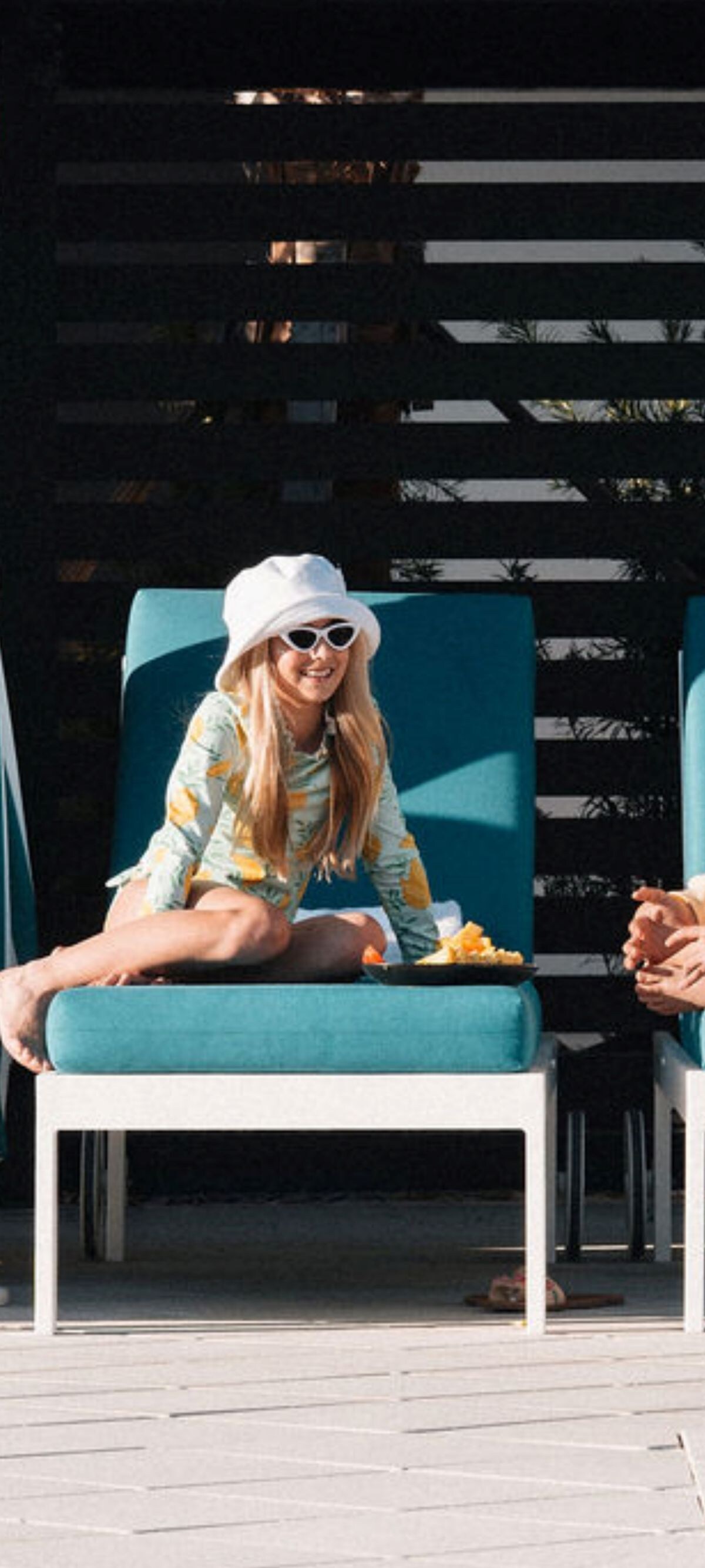 Family Enjoys Pool Cabana