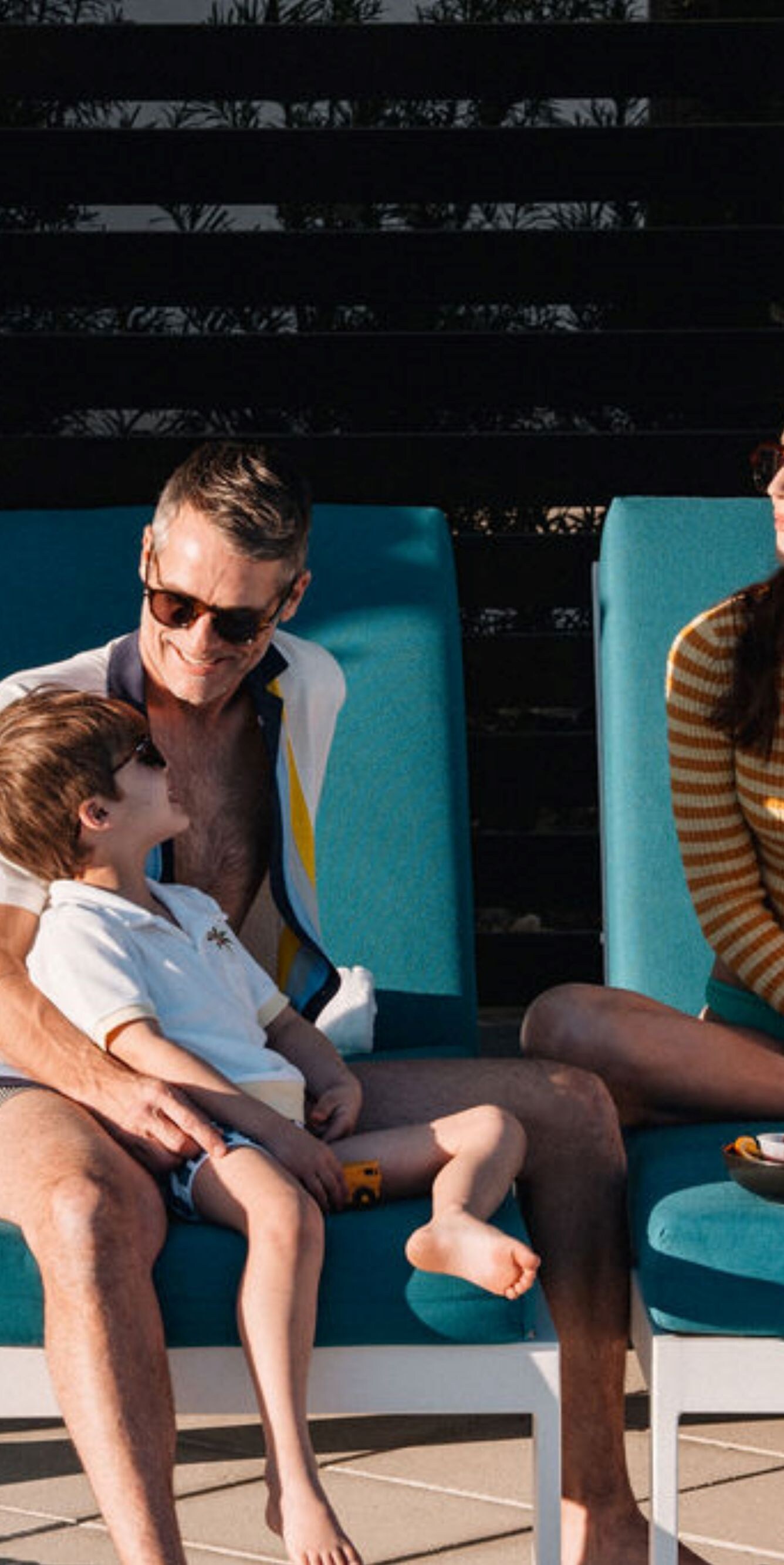 Family enjoys Orlando resort pool cabana