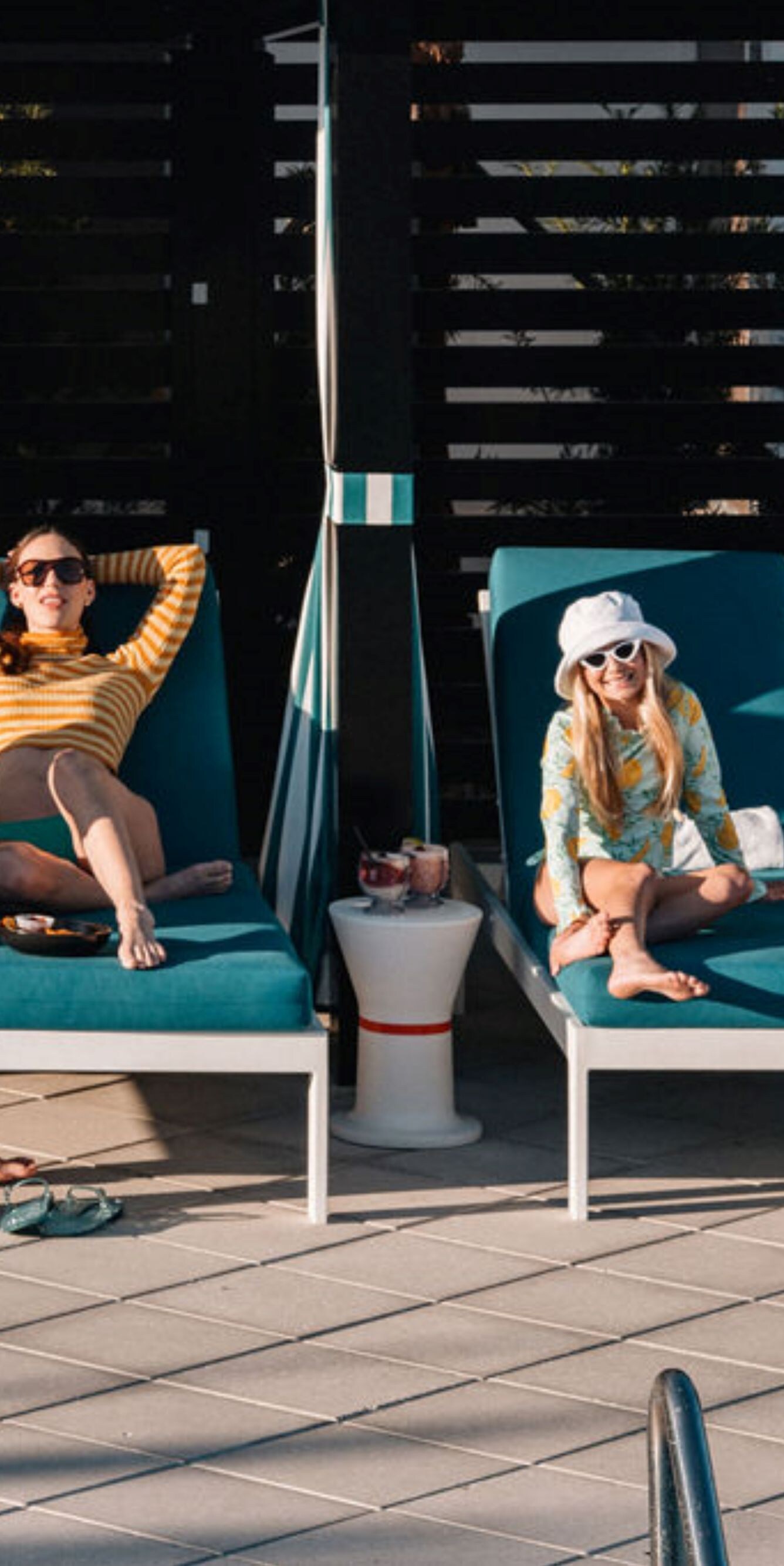 Family enjoys Orlando resort pool cabana
