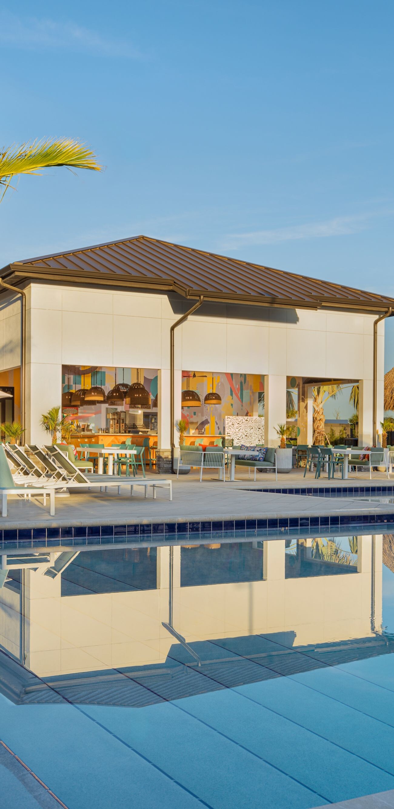 Poolside scene with palm trees