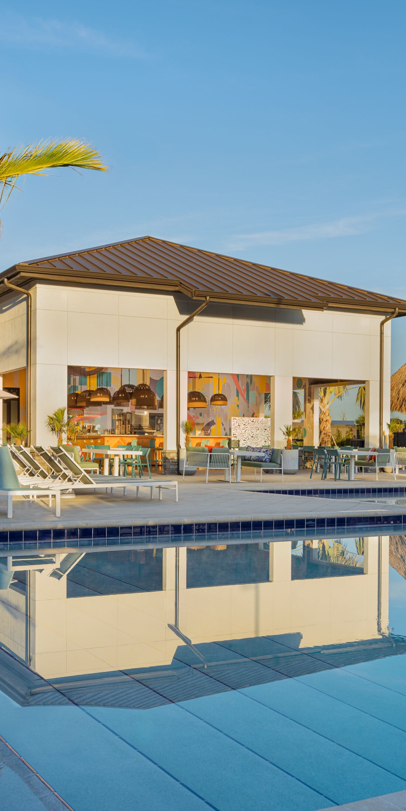 Poolside scene with palm trees