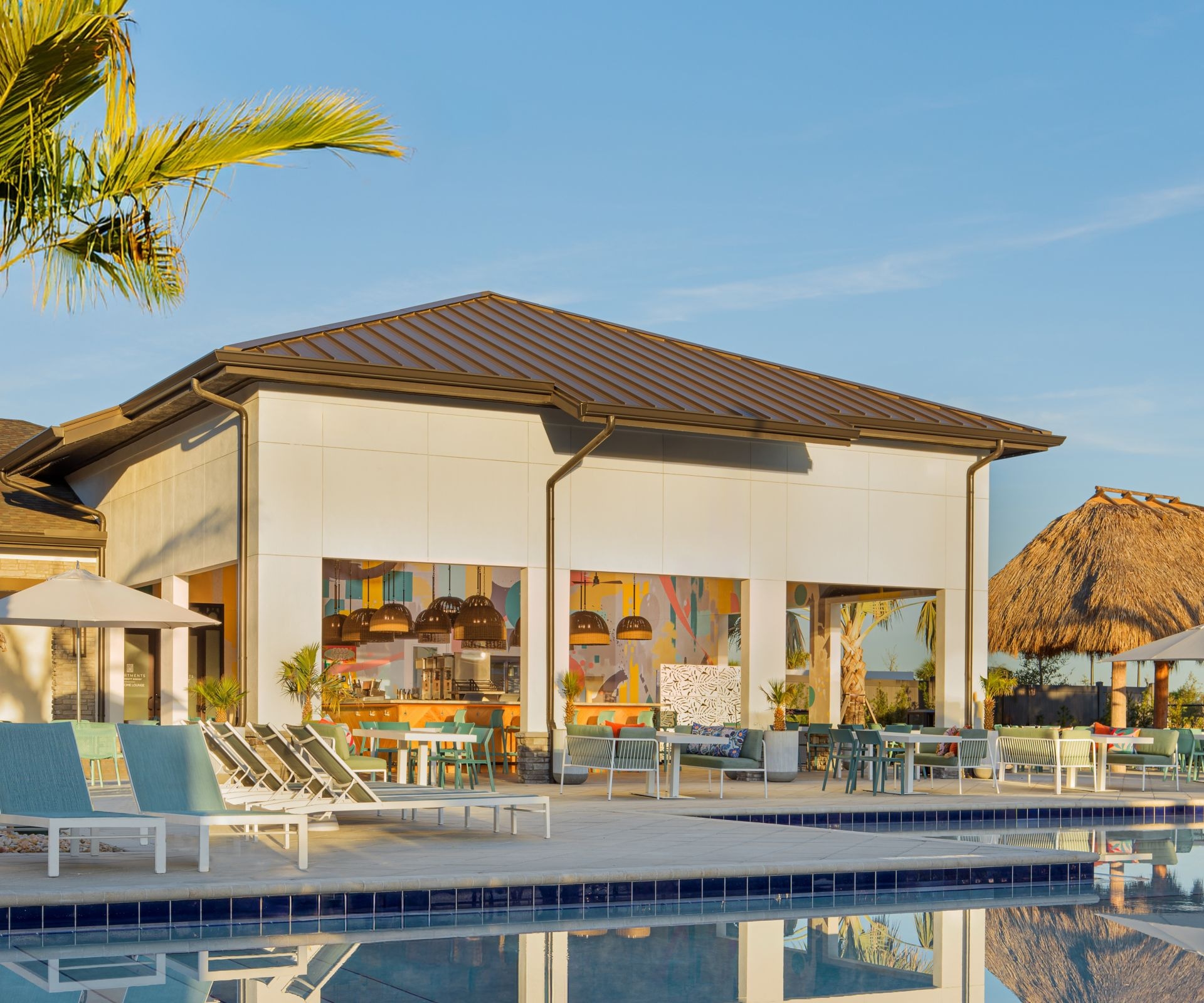 Poolside scene with palm trees