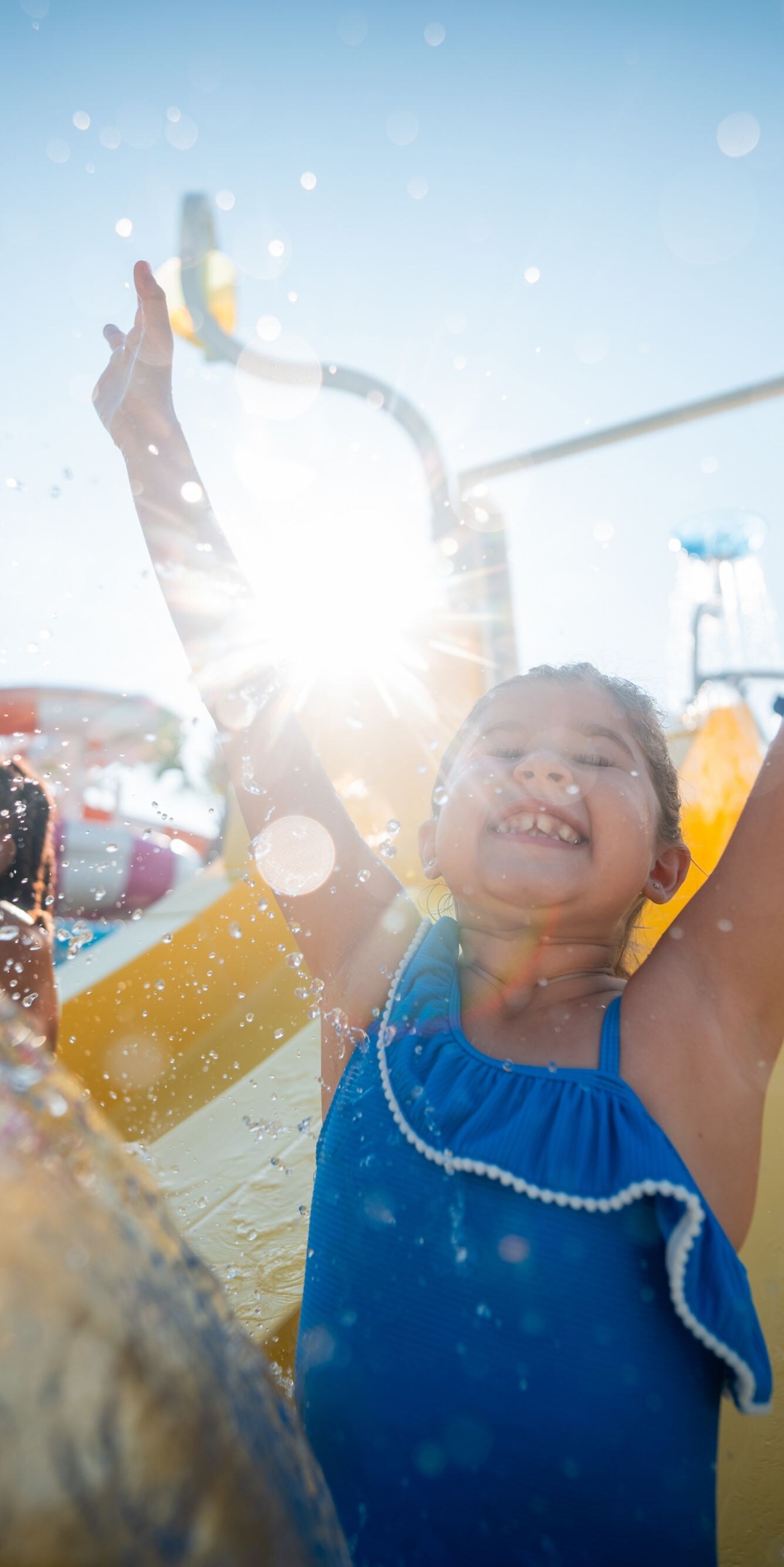 Guest under cascading water splash