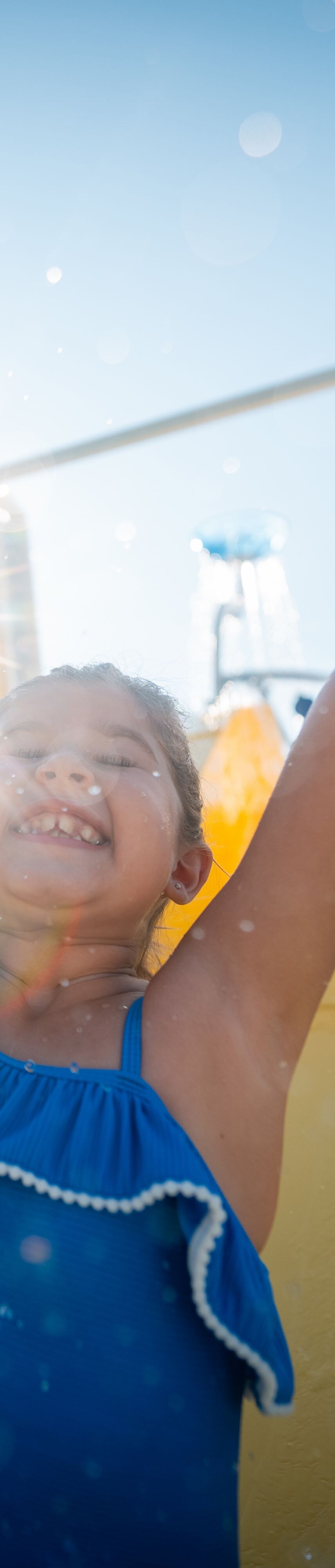 Guest under cascading water splash