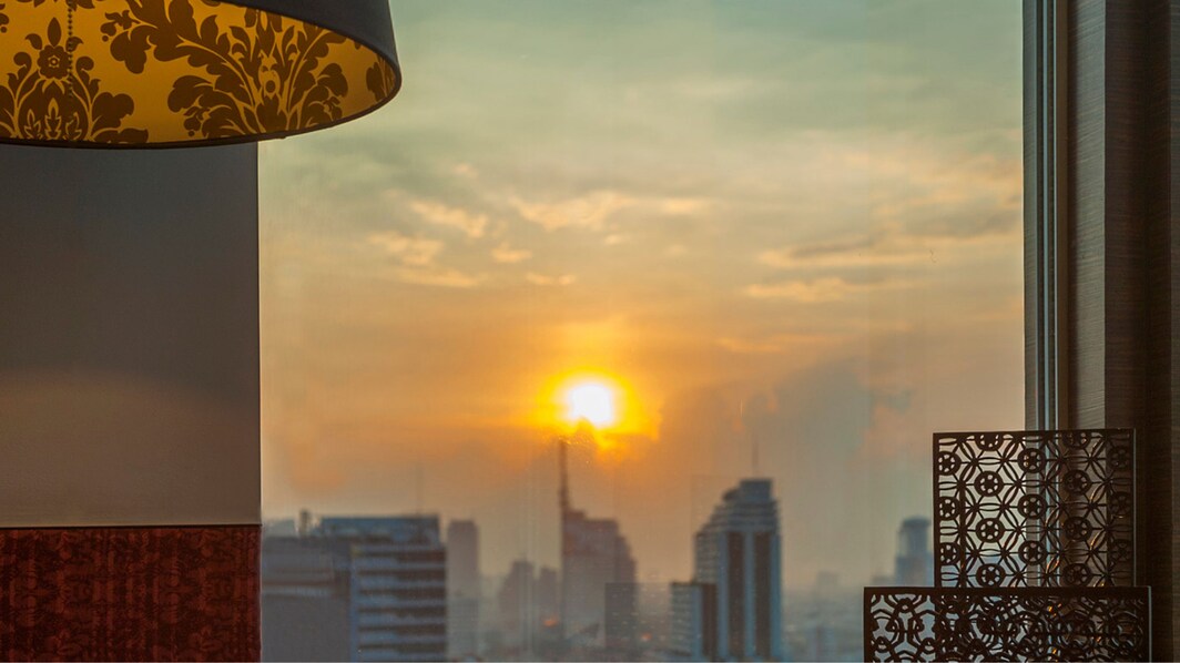 Vista do por-do-sol na cidade de Bangkok do Le Méridien Bangkok
