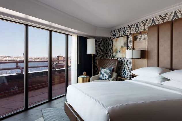 Luxury Waterfront Suite - Bedroom & Balcony