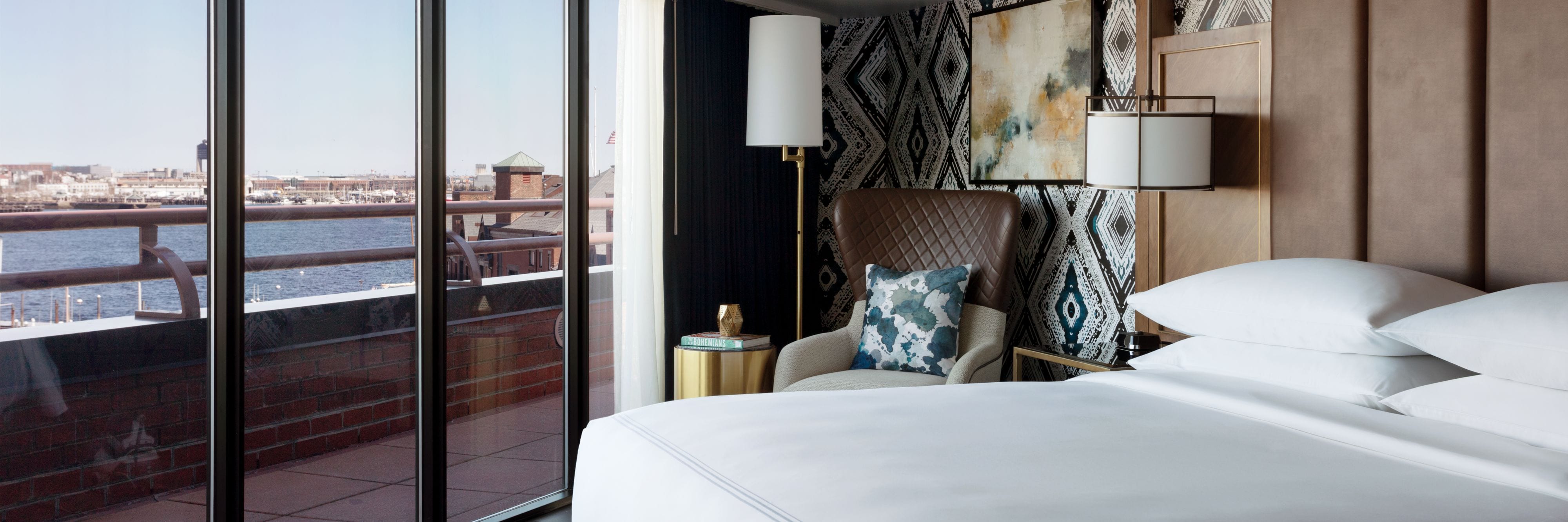 Luxury Waterfront Suite - Bedroom & Balcony