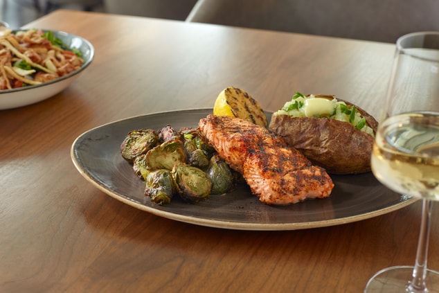 salmon, baked potatoes, brussels sprouts