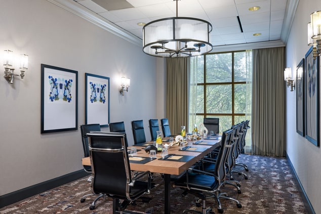 Boardroom with long table and seating