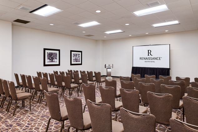 Hotel conference room with podium.