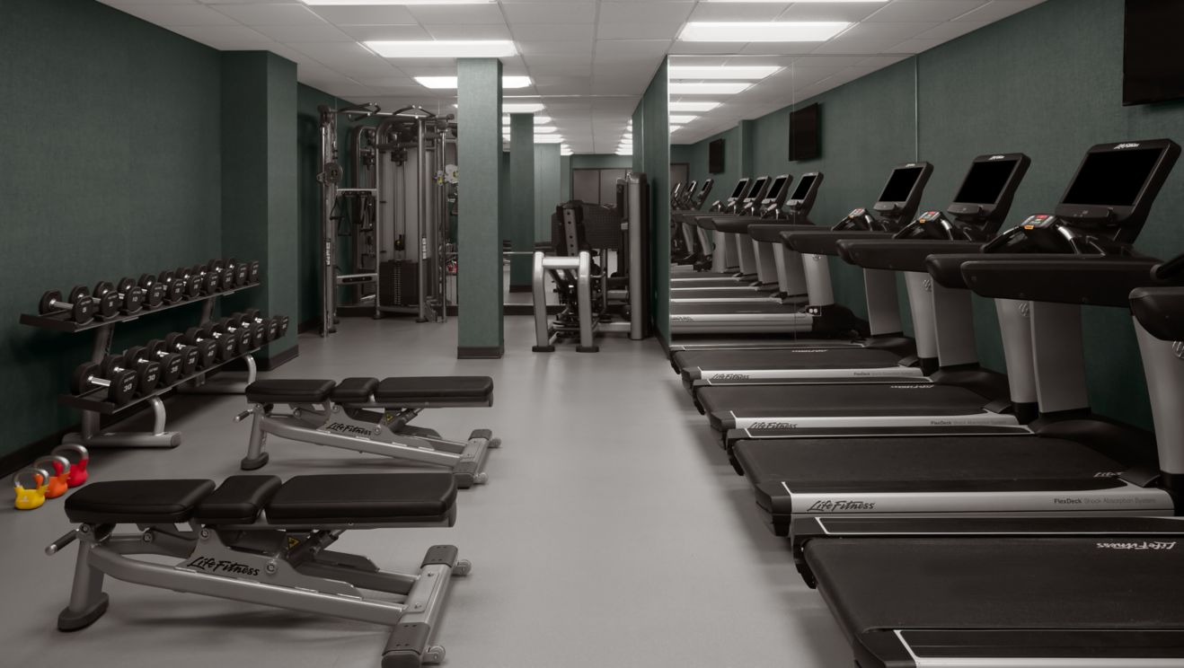 Fitness center with treadmills and weights