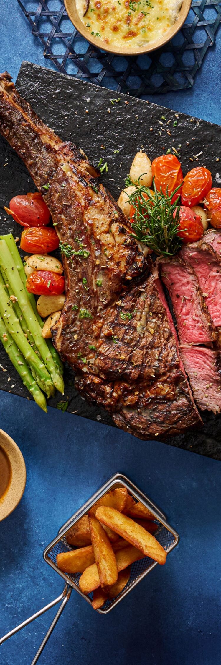 Steak entrée with sides and desserts