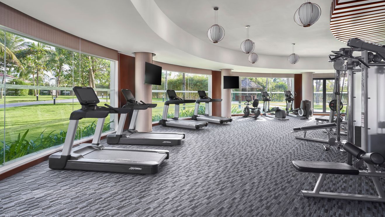 fitness center with cardio and strength equipment