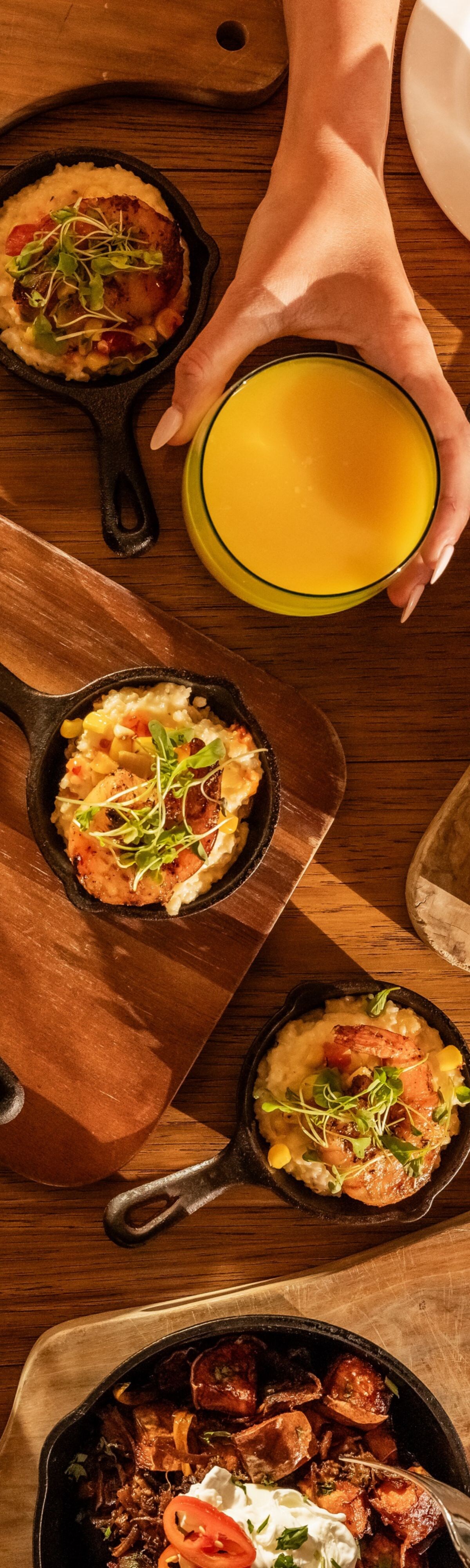 hands and menu, brunch items at table