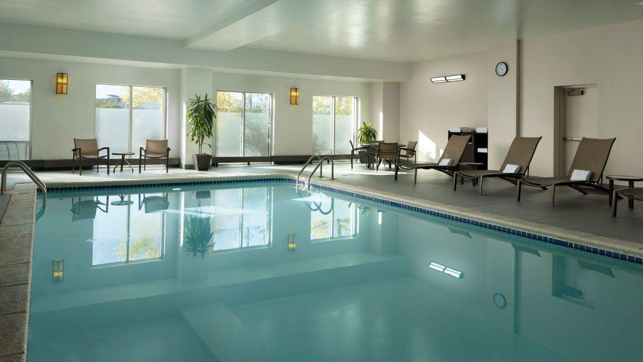 indoor pool with chairs