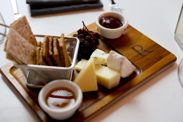 Cheese board with dried fruit and crackers