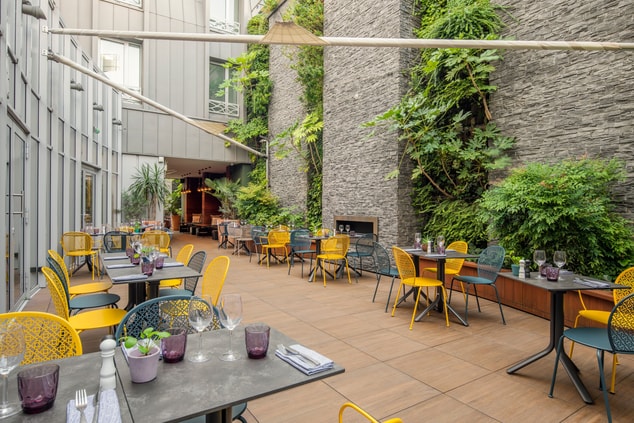 Restaurant terrace, quiet green courtyard 