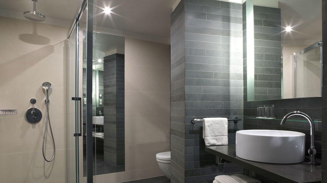 Bathroom with shower and toilets