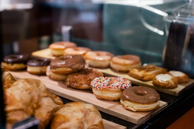 Donuts on a display board