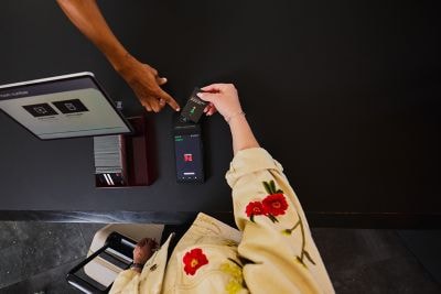 Mobile key check-in at self-service kiosk